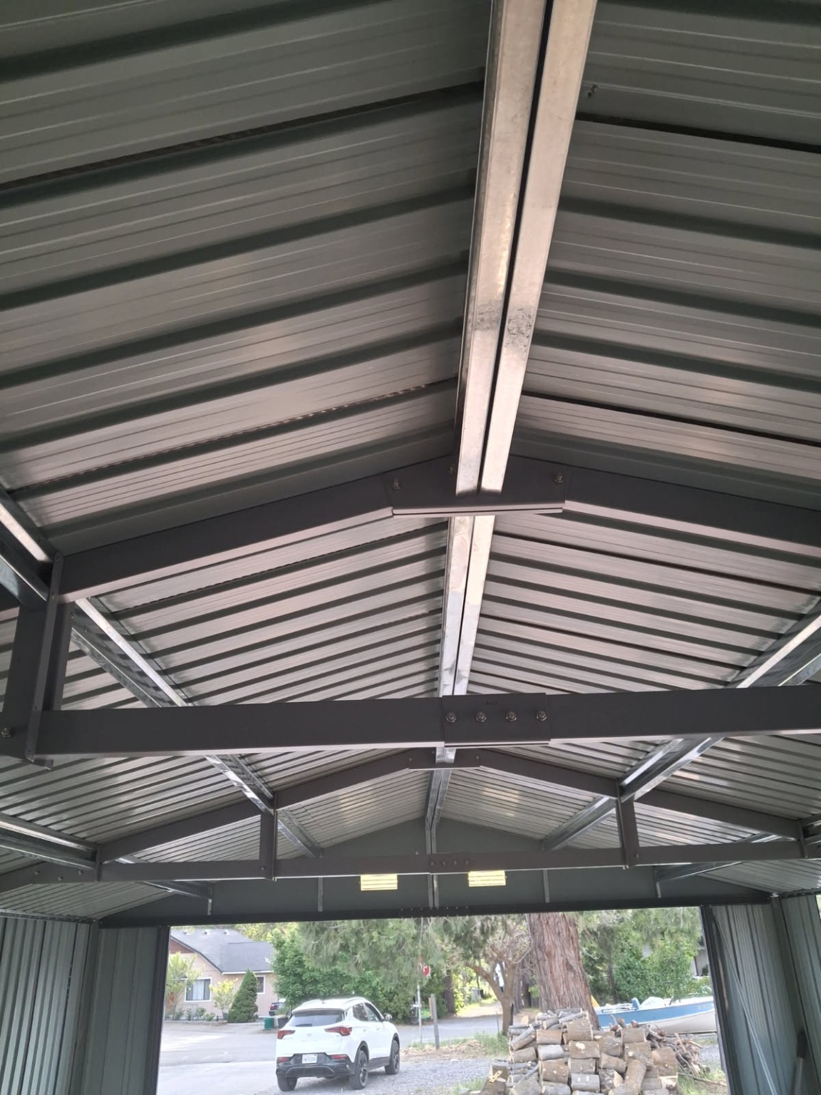 Steel roof framing inside the metal workshop