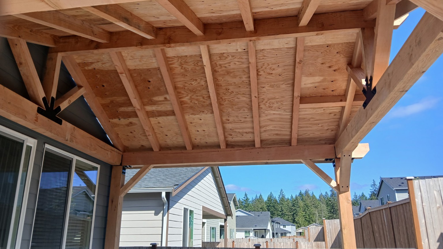 Roof sheathing and exposed timber rafters